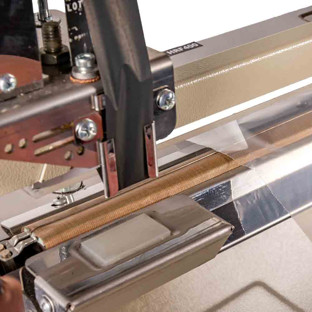 SELLADORA LIPARI CON PIE 40CM REFILADORA CON FECHADOR (HRF400) *UNID